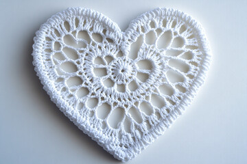 Delicate White Lace Heart Doily on Smooth Surface - Ideal for Wedding Decor and Valentine's Day Crafts