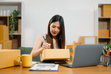 Startup small business SME, Entrepreneur owner woman using smartphone or tablet taking receive