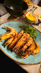 Grilled shrimp. Delicious shrimp on a plate, close-up. Delicious seafood dish