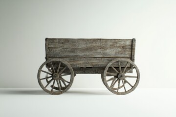 Old wooden wagon on white floor