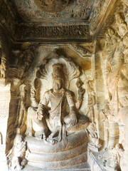 Vishnu seated in Lalitasana, the posture of 