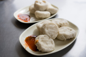 Freshly made dumplings served on plates