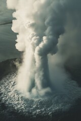 Fototapeta premium Erupting volcano releasing massive clouds of steam and ash over surrounding landscape during daylight hours