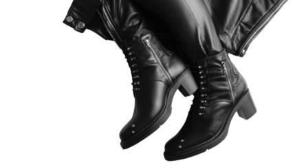 Pair of black leather ankle boots with side zippers on a white background