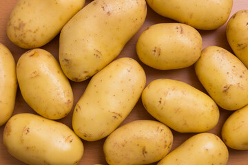 Potatoes carefully stacked in wooden box