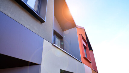 Terraced family homes in newly developed housing estate. The real estate market in the suburbs. New...