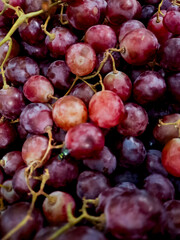 bunch of ripe red grapes, showcasing their juicy, plump appearance. Perfect for food photography
