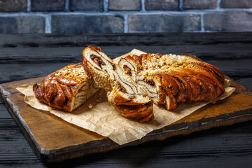Cinnamon braided bread topped with pearl sugar