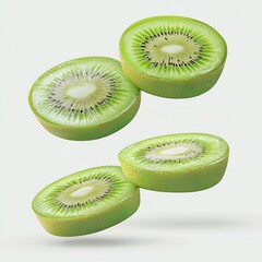Fototapeta premium Fresh sliced kiwi fruit, solid white background. 