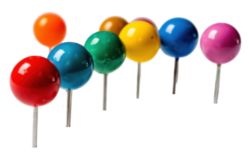 Colorful push pins arranged in a vibrant line on a white background, showcasing creativity and organization in a playful manner isolated on transparent background