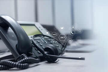 close up telephone voip machine with virtual icon of service provider of communication technology...