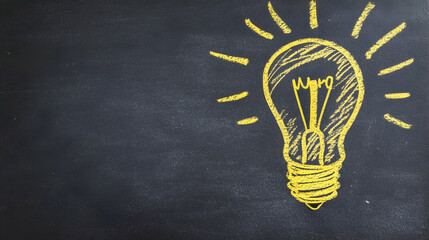 A bright yellow chalk doodle of a lightbulb against a plain blackboard background, symbolizing innovation and creativity  -
