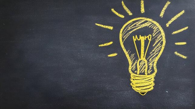A bright yellow chalk doodle of a lightbulb against a plain blackboard background, symbolizing innovation and creativity  -
