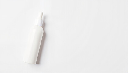 White dropper bottle on minimalist background