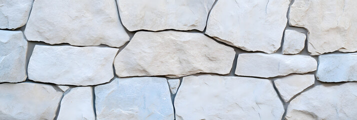 Obraz premium A light stone wall texture with soft dusty silver grey tones interwoven with delicate blue and white accents. The smooth surface features natural ridges and gentle weathering patterns. The subtle