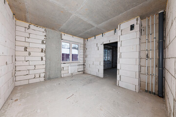Urban Evolution A Raw Canvas of Exposed Brick and Piping Awaiting Transformation and Design Dreams.