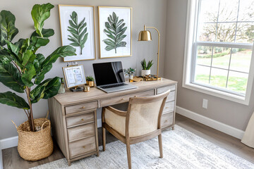 Modern home office setup featuring a wooden desk, laptop, and greenery in a bright room