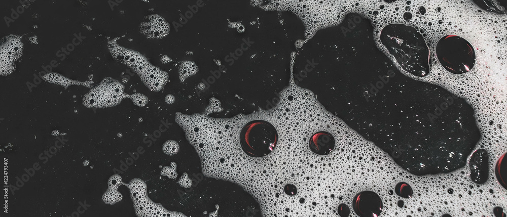Poster bubbles with water droplets on a black background creating a serene and elegant texture effect