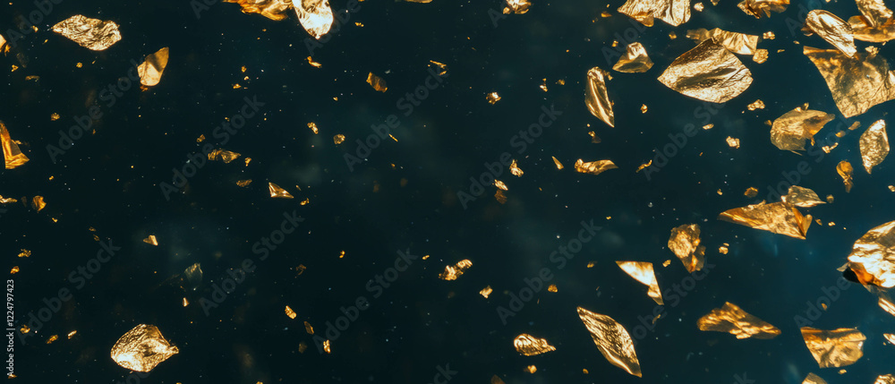 Poster confetti overlay texture combining gold elements on a dark black background