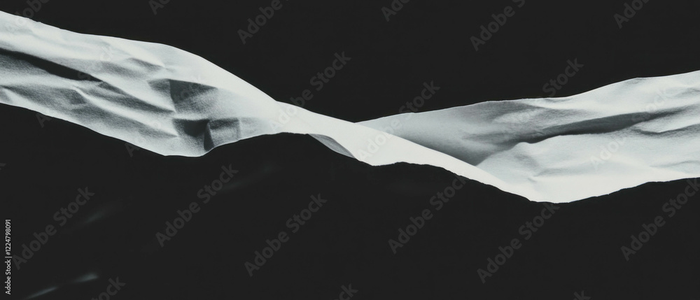 Poster creased and folded paper texture with blank space on black background for creative designs