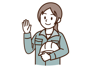 作業着の女性_白いヘルメットを抱える