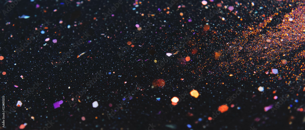 Poster sparkling glitter texture with fine particles creates a festive vibe on a black background