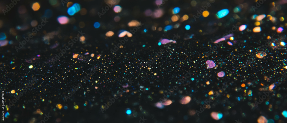 Poster sparkling glitter particles create a mesmerizing overlay texture against a dark background