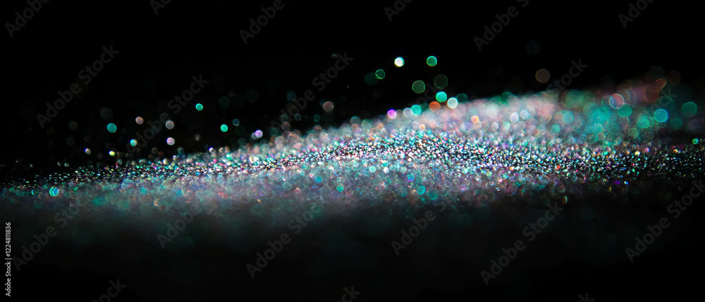 Poster Glitter particles glowing against a dark background creating a striking visual effect