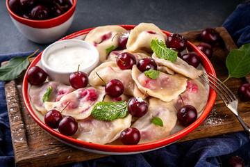 Traditional West Europe cherry pierogi dumplings