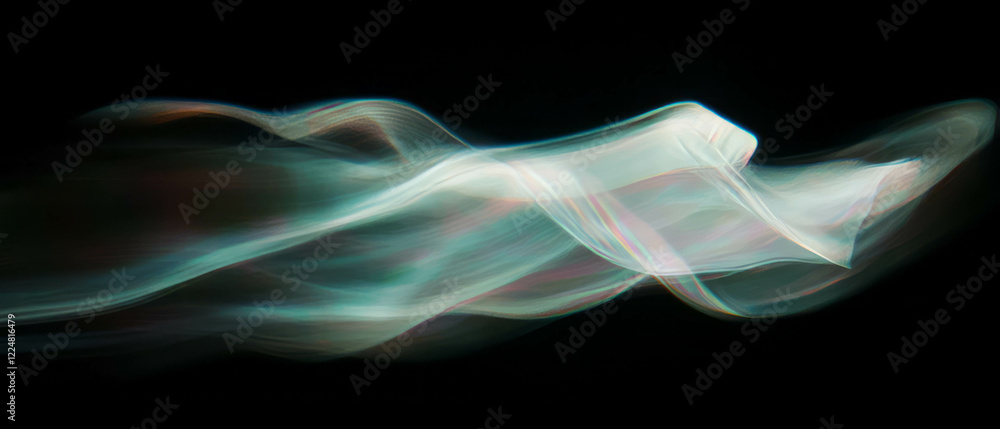Poster Dynamic light trails creating mesmerizing motion effects against a black background