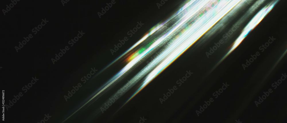 Poster Dramatic light texture with harsh edges creating a striking contrast on black background