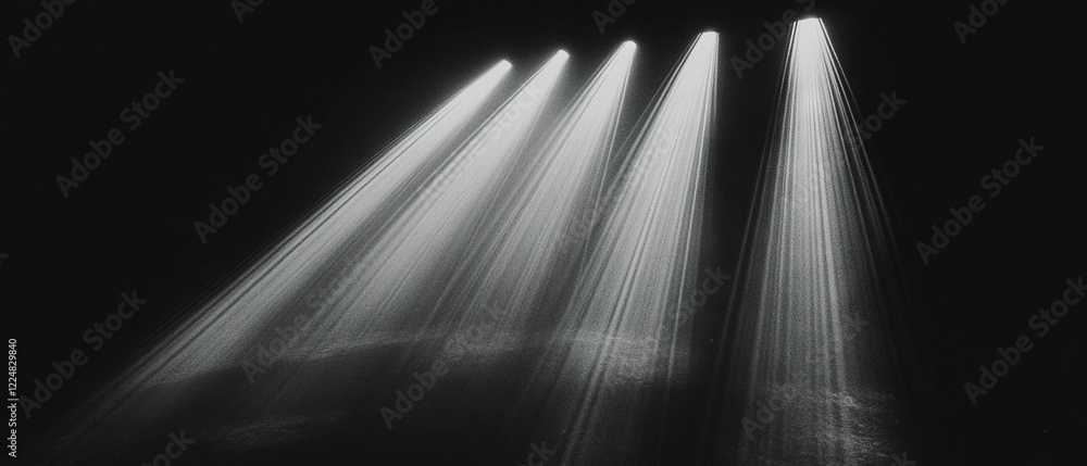 Poster Rays of light creating dramatic texture with focused beams on a dark background