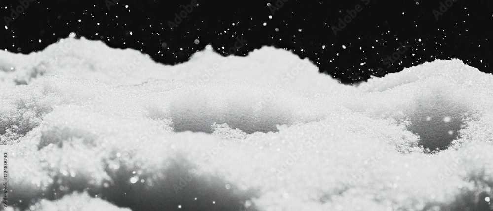 Poster Exploring the intricate textures of snow with stark shadows on a black background