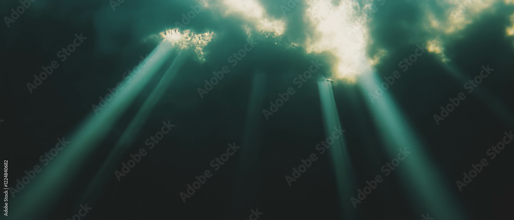 Fototapete light rays break through clouds, creating a calm and ethereal atmosphere in deep space