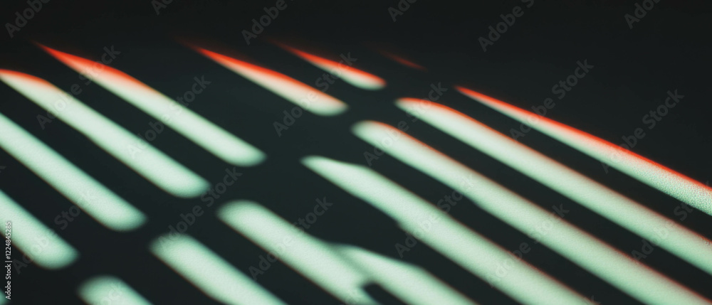 Poster window blinds shadows create abstract striped patterns on a dark surface
