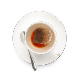Tea bag in cup with hot drink isolated on white, top view