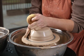 Hobby and craft. Woman making pottery indoors, closeup