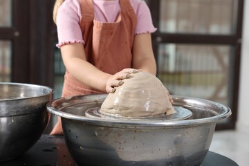 Fototapeta premium Hobby and craft. Girl making pottery indoors, closeup