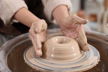 Hobby and craft. Woman making pottery indoors, closeup