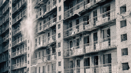 destroyed and burned houses in the city in Ukraine