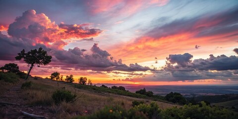 Fototapeta premium Serene Sunset: Vibrant Cloudscape with Tilt-Shift Effect
