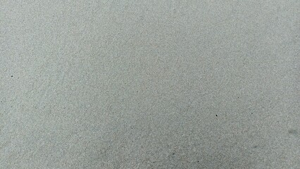 Smooth sandy texture background, ideal for beach themes and natural aesthetics