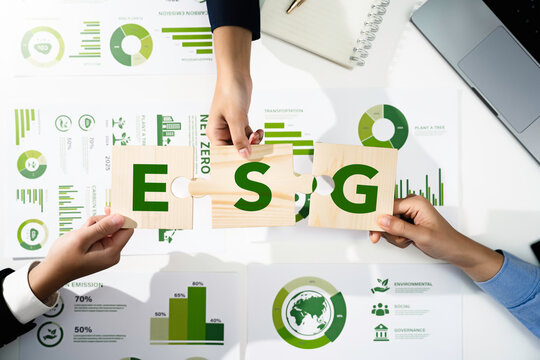 ESG environmental social and governance Green business concept. Business group put jigsaw together, Meeting carbon credit report, Green investment strategy concept to Sustainable Environment