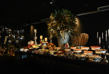 christmas ,table setting with decorations,christmas cookies and candle, table setting for a dinner, table with food, haute cuisine, table with food, christmas decorations
