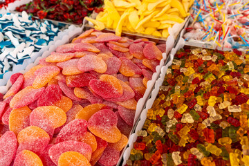Assortment of sweets offered at a market stall