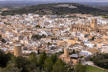 Obraz premium Townscape of Felanitx, Mallorca, Balearic Islands, Spain, Europe, with view to St Michael's church (Sant Miguel) and two restored old windmill towers