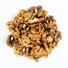 Shelled walnuts on a white background close-up