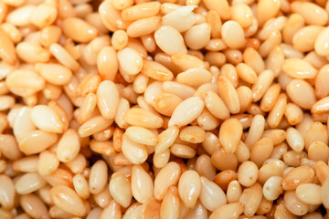 Fototapeta premium Macro Closeup of sesame seeds pile background
