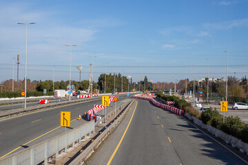 Road dividing barriers, road signs.