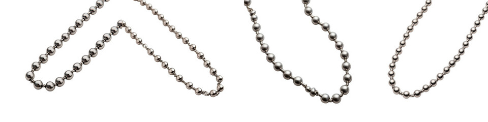 Obraz premium Elegant metallic necklace chains with beads and pendants displayed against a monochrome textured backdrop The image showcases the intricate design and luxurious